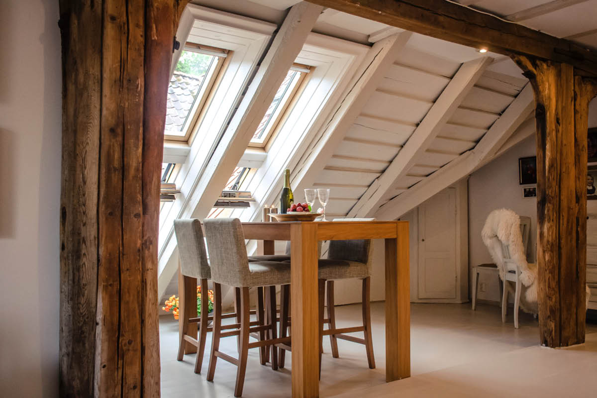 Loft Conversion in Exeter with Wooden Beams by Silver Fern