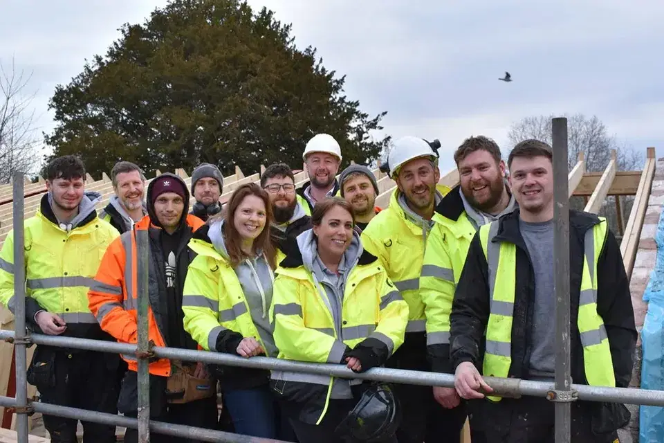 Silver Fern Developments team together on a construction site in Exeter