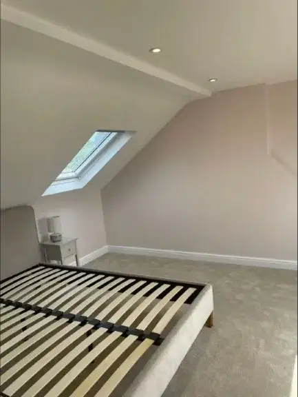 Completed master bedroom in the Heavitree loft conversion