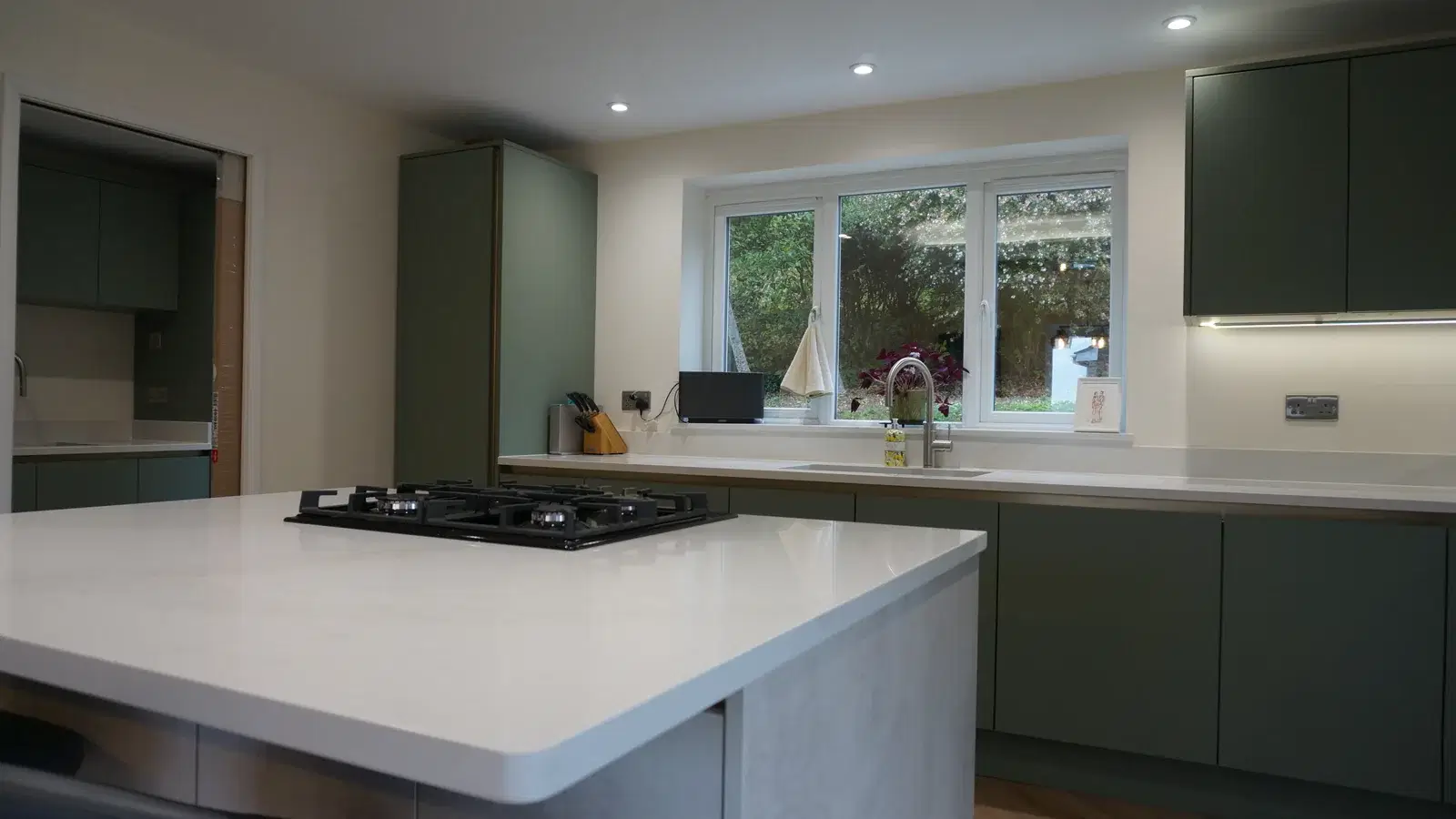 Renovations and remodels: completed kitchen with island and fitted cabinetry